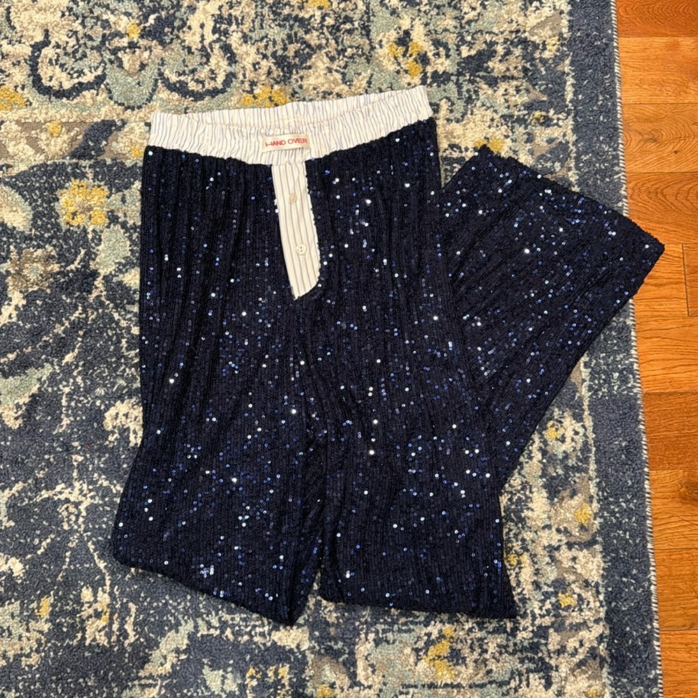 Hand over pants